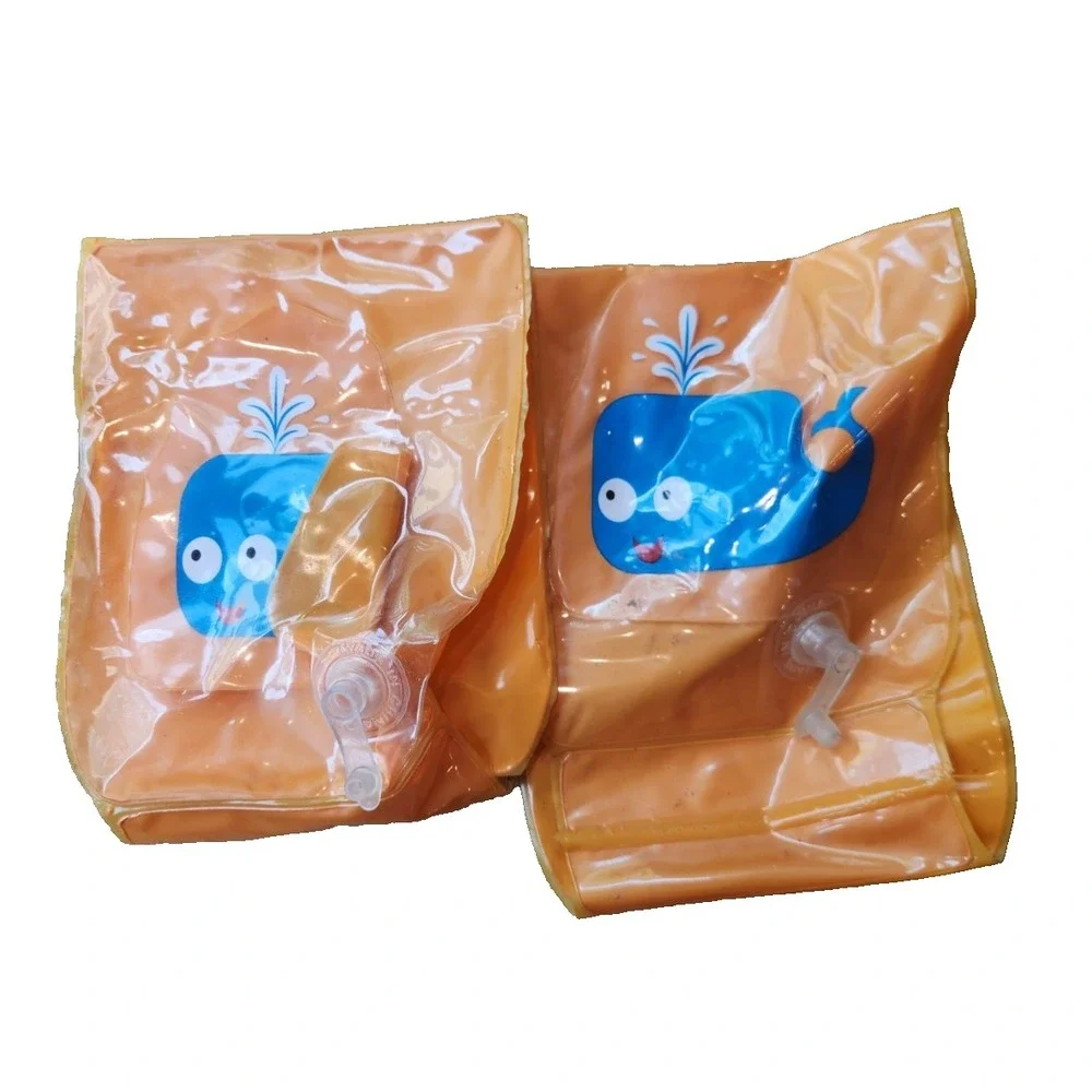 Children's Orange Inflatable Arm Floaties with Blue Whale Graphic